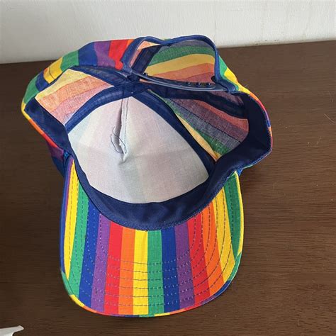 90s gay man in hat